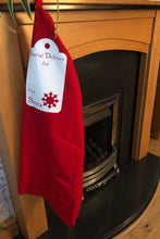 Load image into Gallery viewer, Empty Santa Sack hanging on the fireplace